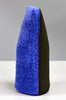 Klaren's royal blue fine grade microfiber wash mitt, standing tall, with an advanced synthetic clay surface.